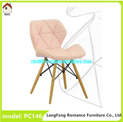 silla de comedor de cuero de PVC de colores con patas de madera y acero pc146